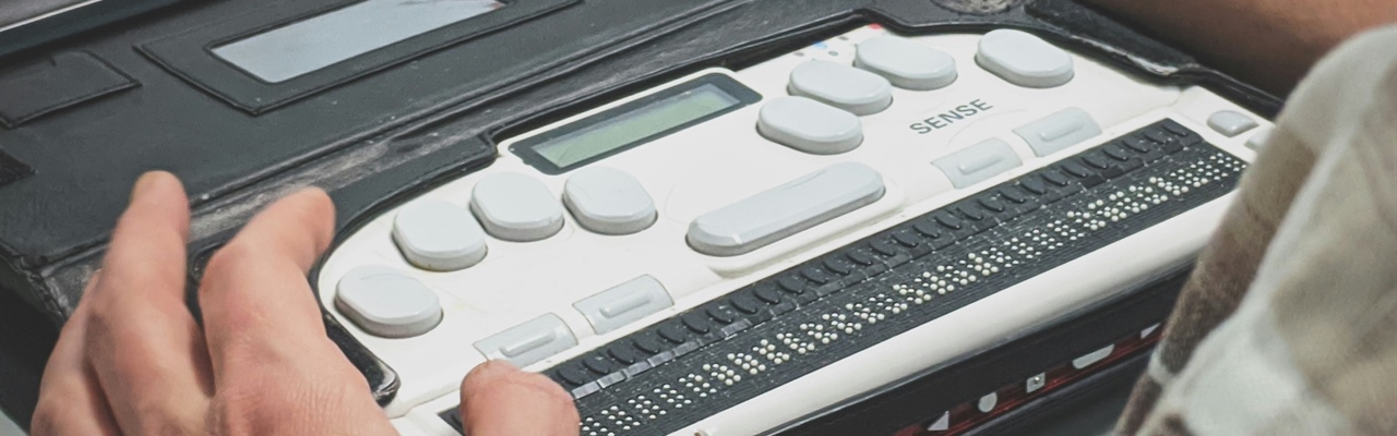 A person operating a voice recorder