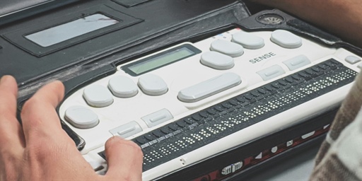 A person operating a voice recorder